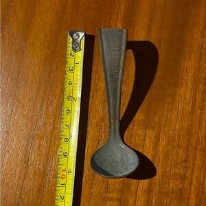 Vintage creamery milk spoon